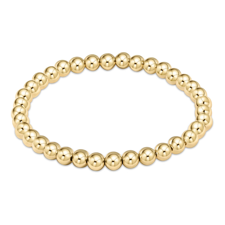 Enewton Classic Gold 5MM Bead Bracelet with round gold beads, stylish accessory for casual or formal wear.