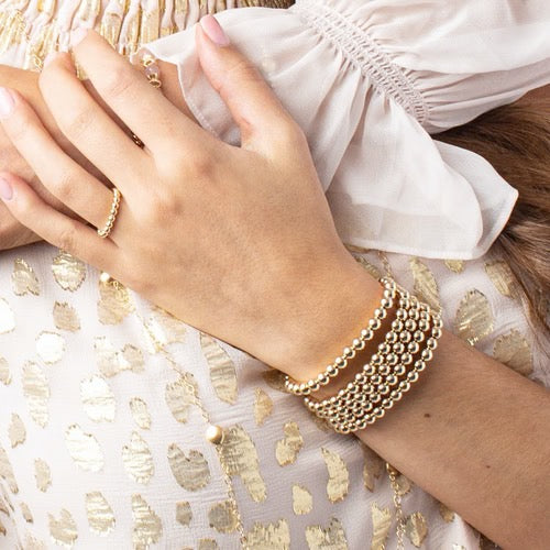 Enewton classic gold 5mm bead bracelet with round beads, stylish jewelry accessory, on a neutral background