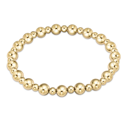 Enewton Classic Gold 6MM Bead Bracelet with gold-toned beads, stylish accessory for men and women, close-up view.