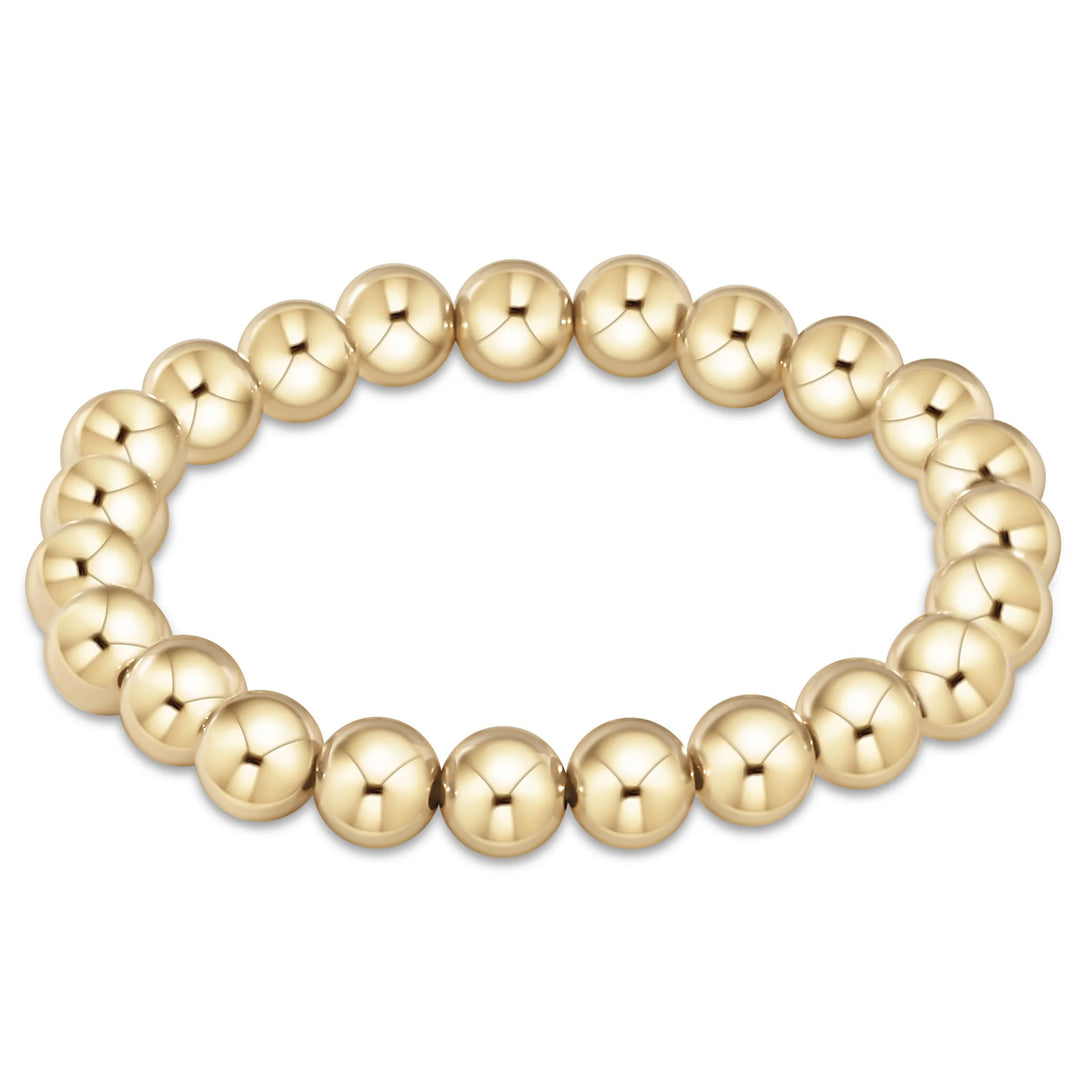 Enewton Classic Gold 8mm Bead Bracelet with round gold beads, stylish accessory for everyday wear.