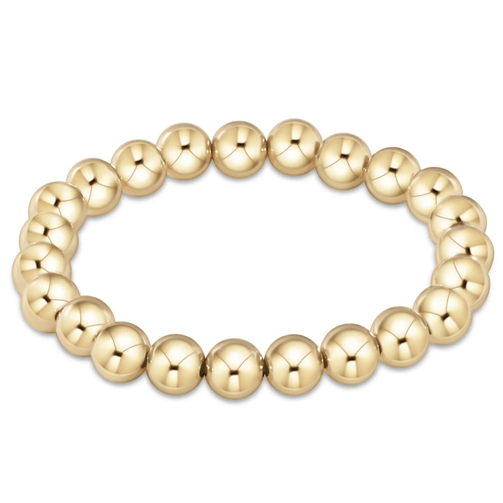 Enewton Classic Gold 8mm Bead Bracelet with round gold beads, stylish accessory for everyday wear.