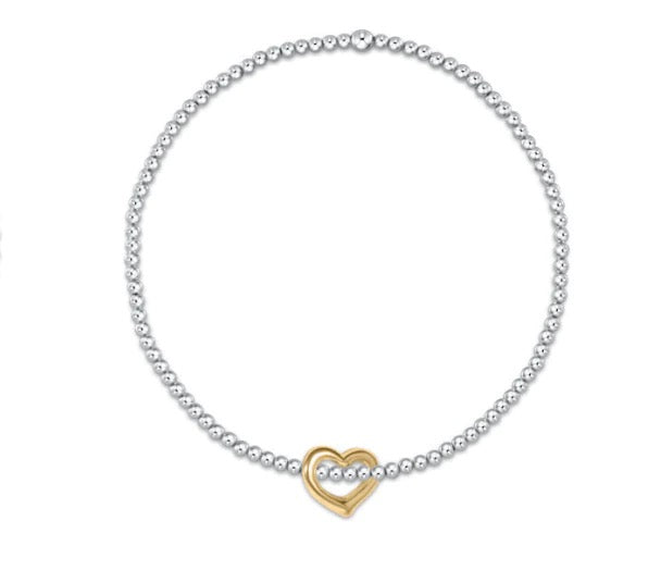 Enewton classic sterling mixed metal 2.5mm bracelet with a gold love charm, featuring a sleek, stylish accessory design.