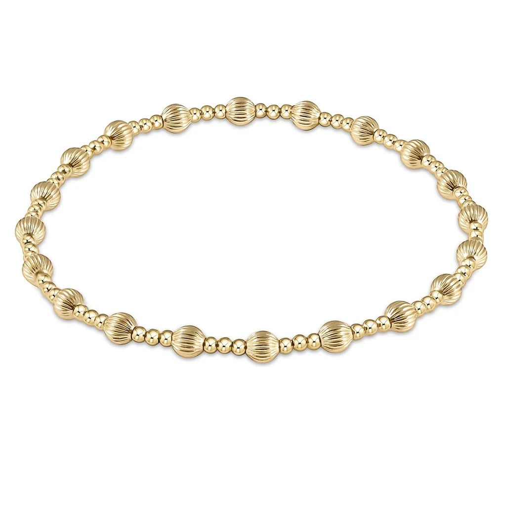 Enewton Dignity Sincerity Pattern gold 4mm bead bracelet with intricate design, showcasing elegant accessory for stylish outfits.