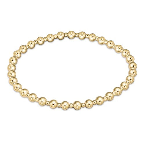 Enewton Grateful 4mm gold bracelet with engraved charm, stylish accessories for elegant wrist jewelry display.