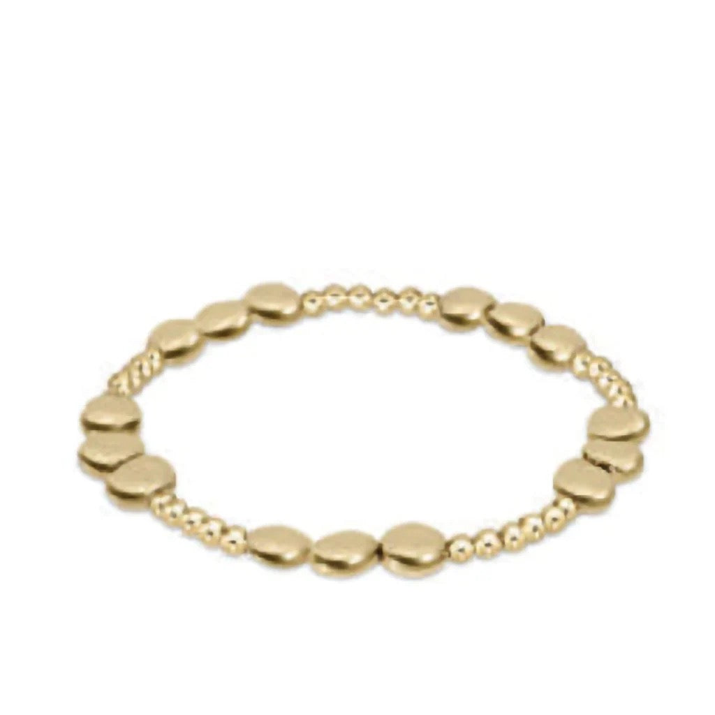 Enewton Honesty Joy 6mm gold bead bracelet featuring small, shiny gold beads on a delicate string for stylish accessories.