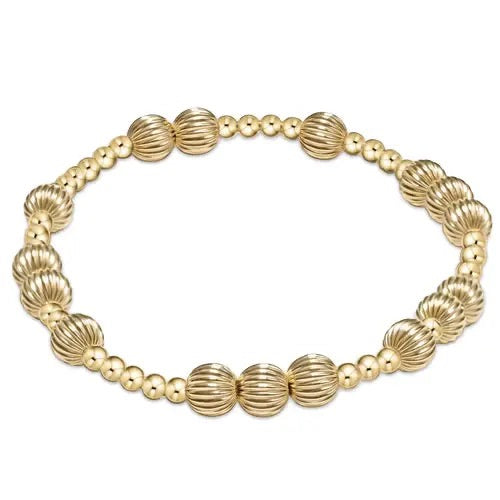 Enewton Hope Unwritten Dignity 6MM gold bracelet showing a sleek, polished design with engraved details on a delicate chain.