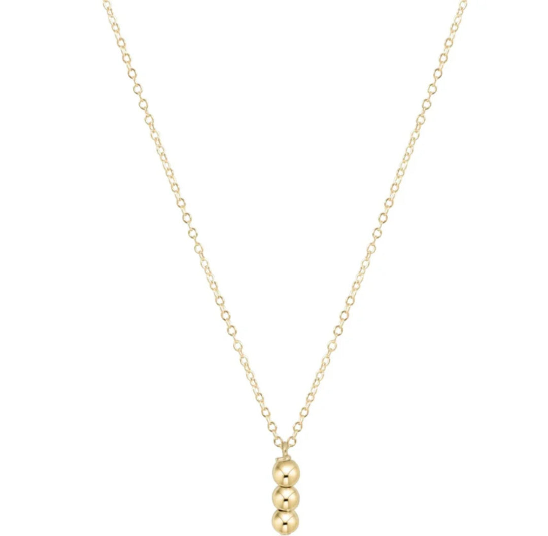Enewton Joy Charm Gold 3mm Bead 16-inch necklace with small gold beads, styled as a delicate accessories piece.