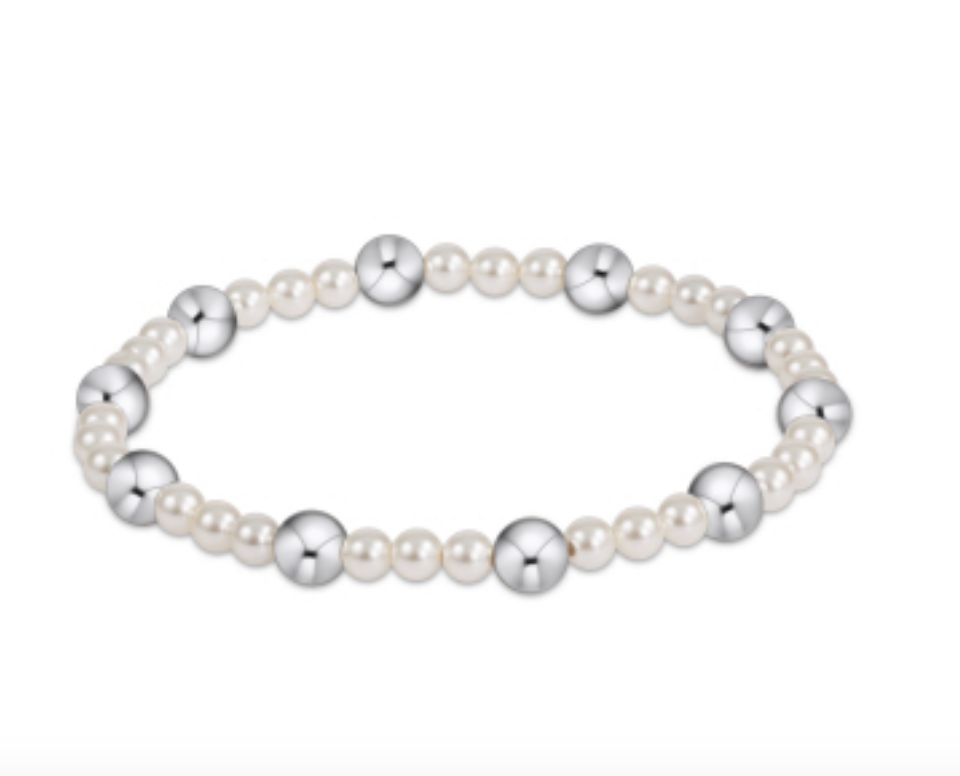 Sterling silver bracelet with 4mm pearl beads, featuring a classic and elegant design by Enewton.