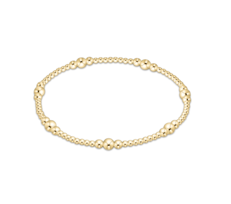 Enewton Purpose Gold 4mm bead bracelet featuring small gold beads on an elastic cord, stylish accessories for everyday wear.
