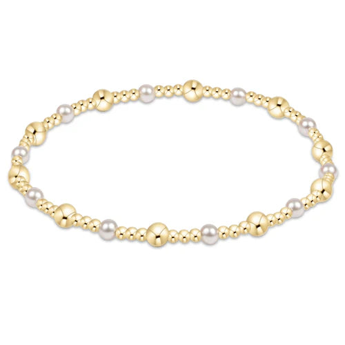 Enewton Sincerity Gold and Pearl 4MM bracelet featuring gold beads and pearl accents, stylish accessory for elegant occasions.
