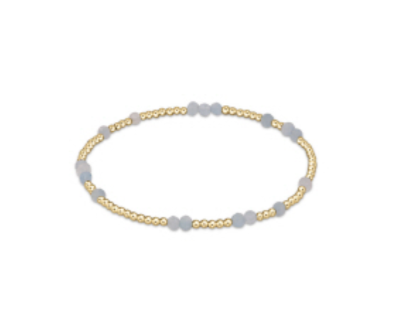 Enewton Hope Unwritten gemstone bracelet featuring colorful beads and silver accents, styled as a fashionable accessories piece.