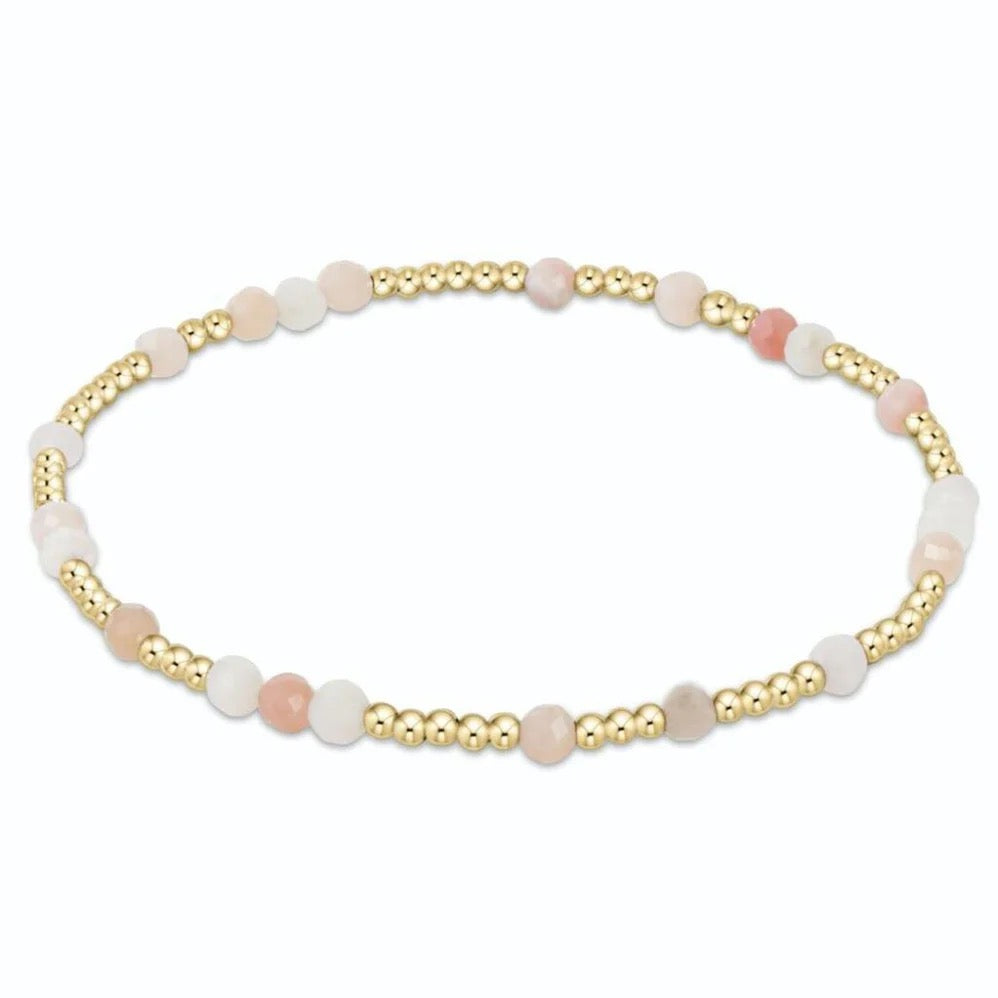 Enewton Hope Unwritten gemstone bracelet featuring colorful beads and a silver toggle clasp, styled as an accessories piece.