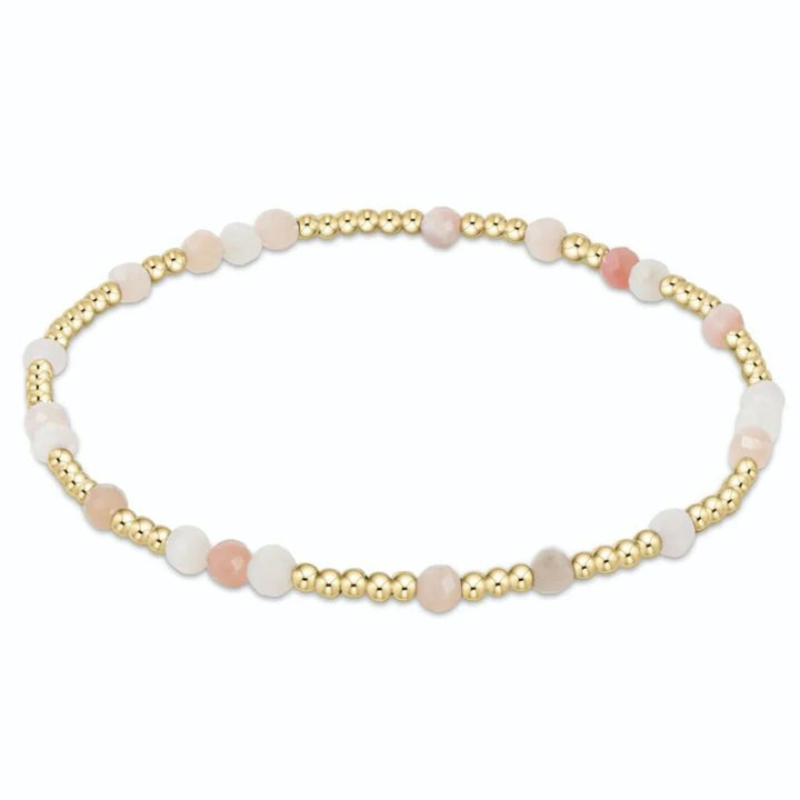 Enewton Hope Unwritten gemstone bracelet featuring colorful beads and a silver toggle clasp, styled as an accessories piece.