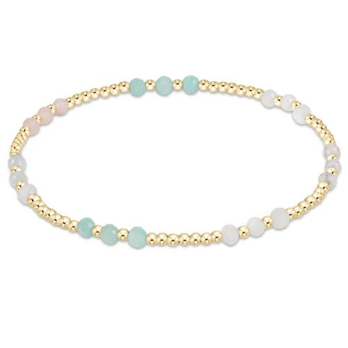 Enewton gemstone gold joy pattern 3mm bead bracelet with colorful beads and intricate design on a neutral background