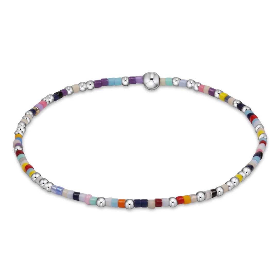 Sterling silver Hope Unwritten bracelet by Enewton, showcasing a delicate chain and engraved Hope Unwritten pendant.