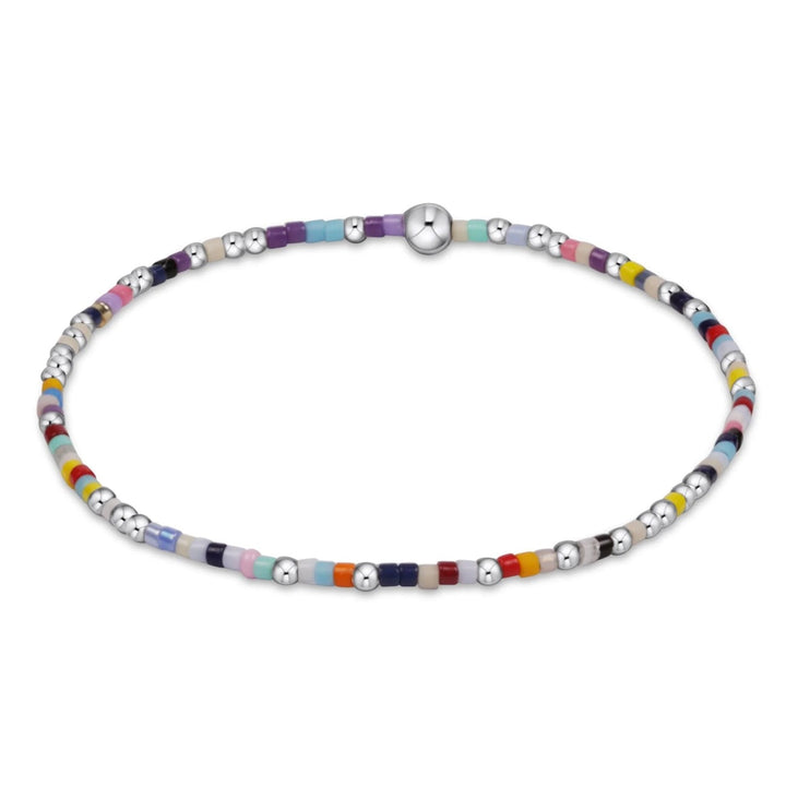 Sterling silver Hope Unwritten bracelet by Enewton, showcasing a delicate chain and engraved Hope Unwritten pendant.