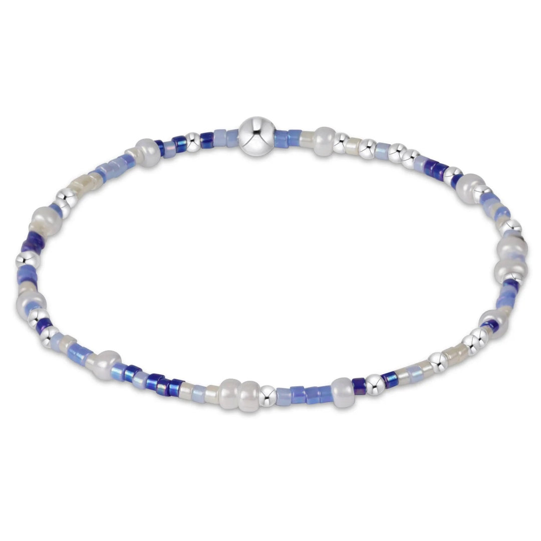 Hope Unwritten sterling bracelet by Enewton, stylish silver accessory with engraved design, displayed on a neutral background.