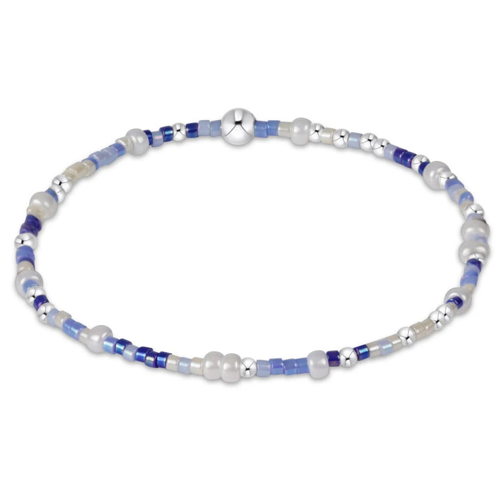 Hope Unwritten sterling bracelet by Enewton, stylish silver accessory with engraved design, displayed on a neutral background.