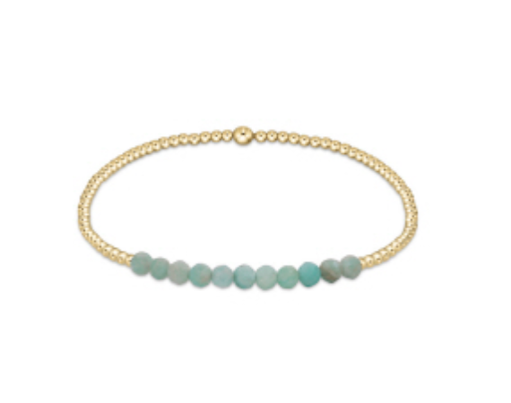 Enewton Gold Bliss 2MM Bead Bracelet featuring small gold beads on a delicate jewelry accessory.