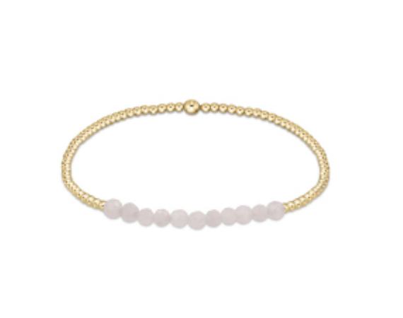 Gold Bliss 2mm bead bracelet by Enewton featuring small gold beads on a delicate elastic band, stylish accessories for everyday wear.