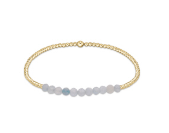 Enewton Gold Bliss 2MM Bead Bracelet featuring small gold beads on a delicate elastic cord, stylish accessories for everyday wear.