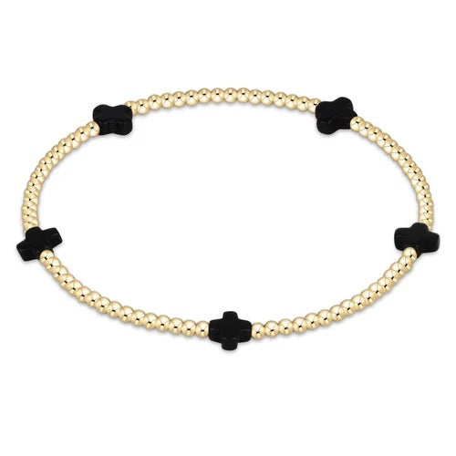 Enewton Signature Cross Small 2MM Gold Bracelet featuring a delicate cross design, perfect for stylish accessories.