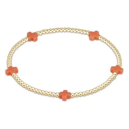 Enewton Signature Cross Small 2MM gold bracelet featuring a delicate chain and small cross pendant, stylish accessories for any outfit.