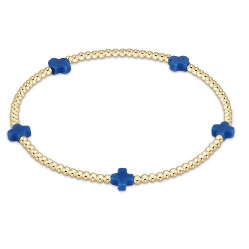 Enewton Signature Cross Small 2MM Gold Bracelet showing a delicate gold bracelet with a small cross charm for accessories.