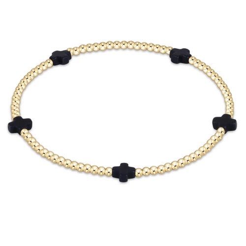 Enewton Signature Cross Small 2MM Gold Bracelet, delicate accessories with a small cross charm and fine gold chain.