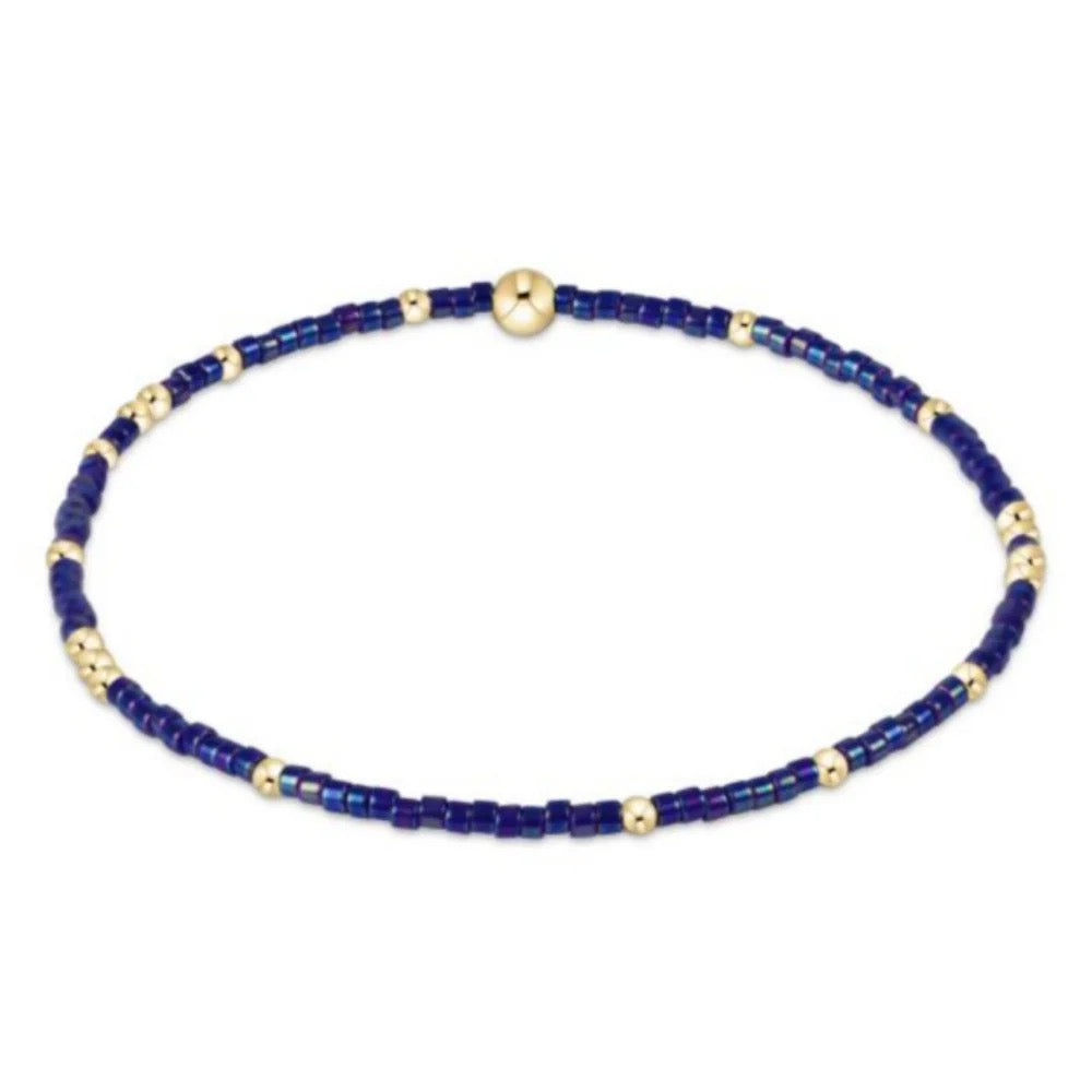Enewton Hope Unwritten bracelet with silver-tone chain and charm, stylish jewelry accessory on a neutral background.