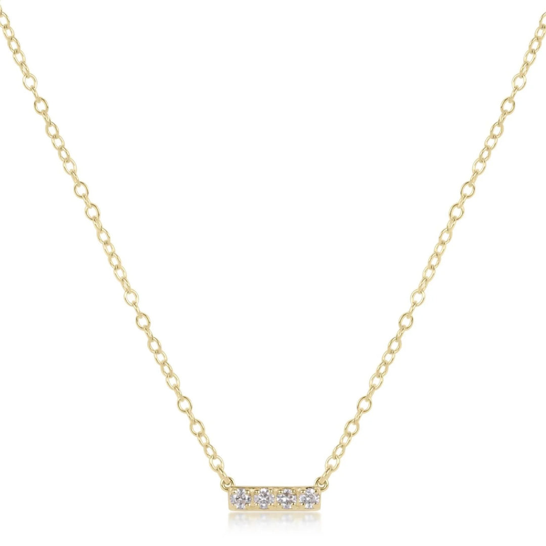 14K gold and diamond bar necklace by Enewton, showcasing a sleek, elegant jewelry piece with sparkling diamonds and a gold bar pendant.