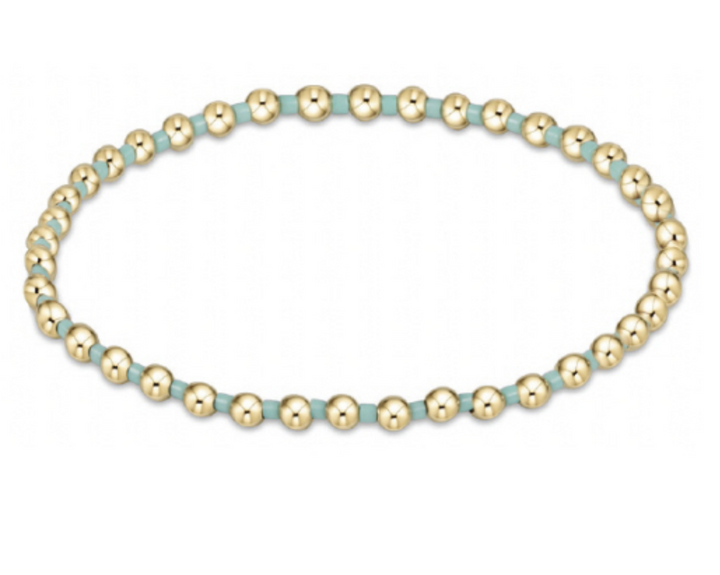 Hope Grateful bracelets by Enewton, stylish accessories featuring delicate band and engraved positive message, on a neutral background.