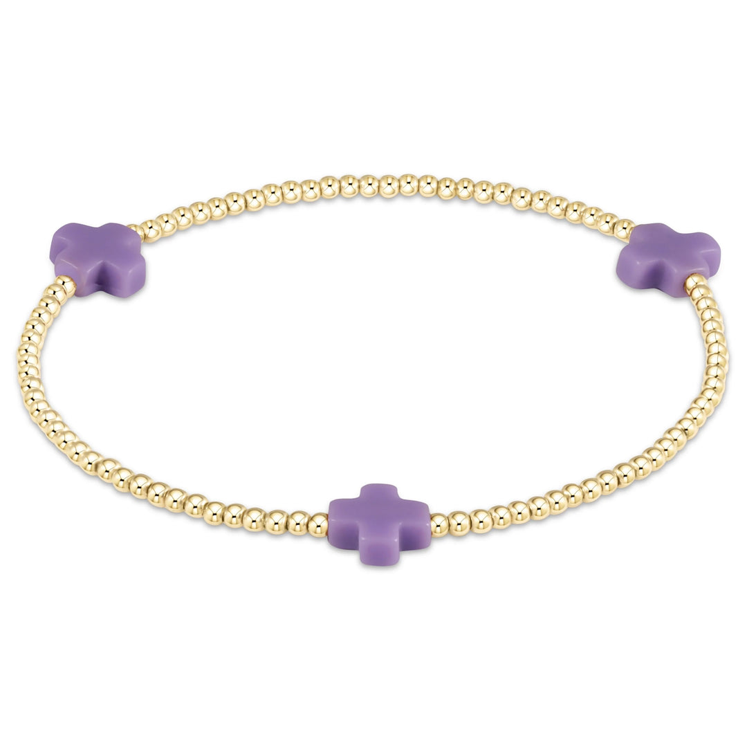 Enewton Signature Cross 2mm gold bracelet, delicate accessory with a small cross charm, stylish and lightweight jewelry piece.