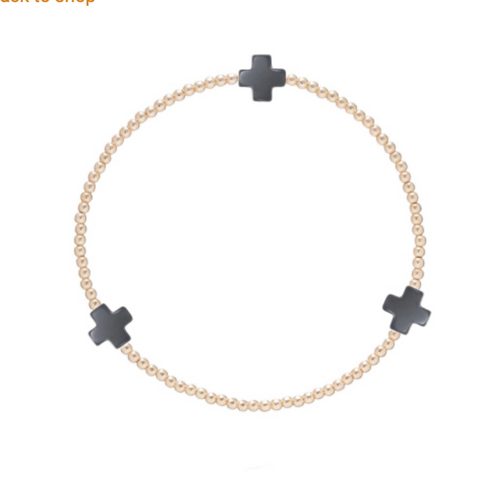 Gold Signature Cross 2mm bracelet by Enewton, featuring a delicate cross charm on a sleek gold chain.