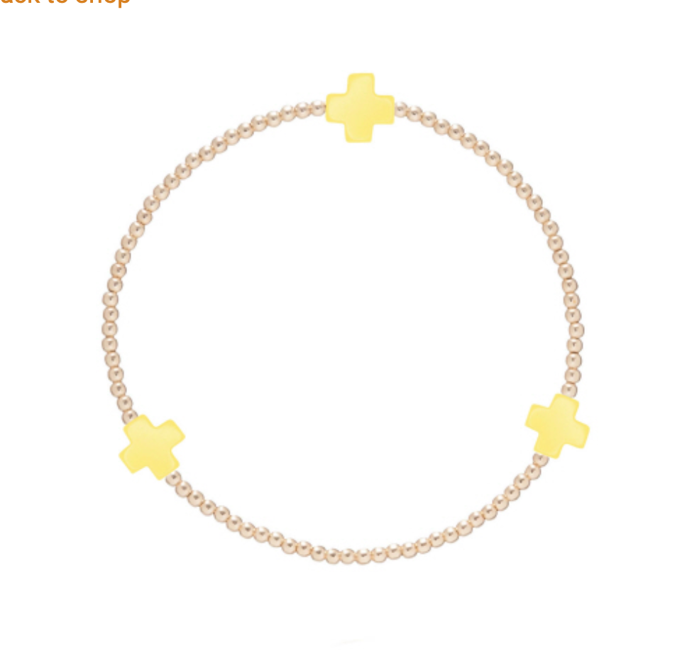 Enewton Signature Cross 2mm gold bracelet, delicate accessory with a small cross charm, crafted for stylish everyday wear.