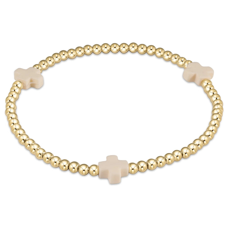 Enewton Signature Cross 3mm bracelet featuring a sleek metal cross charm on a black cord accessory.