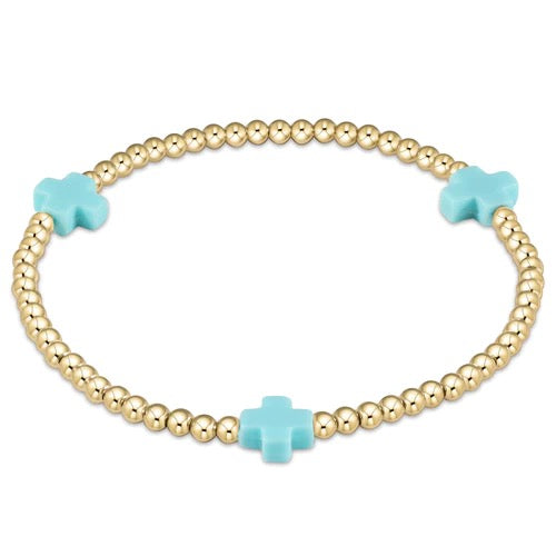 Enewton Signature Cross 3mm bracelet featuring a sleek metal cross charm on a durable cord, stylish accessories for everyday wear.