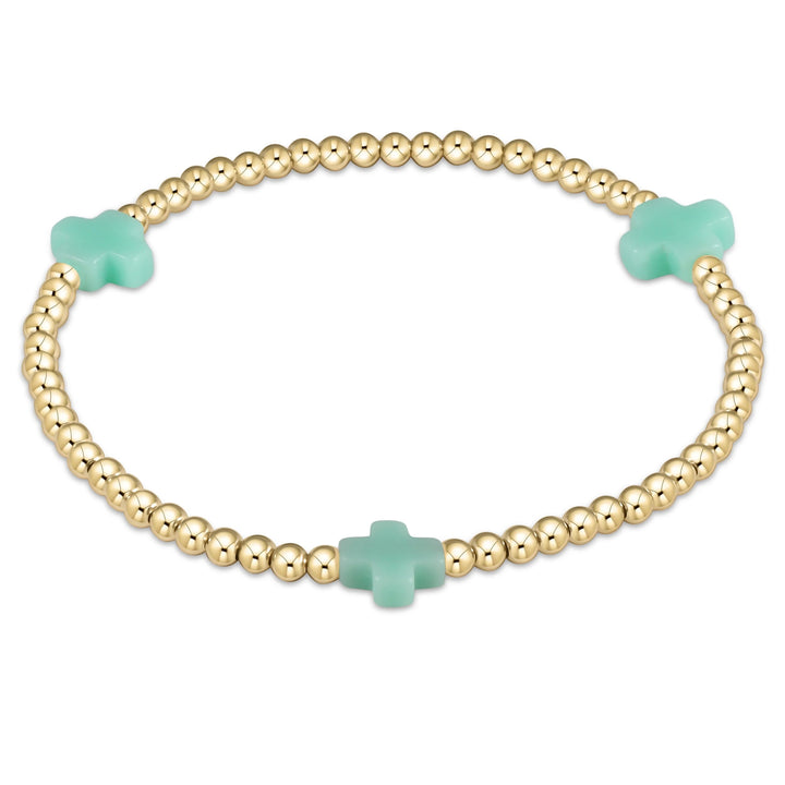 Enewton Signature Cross 3mm bracelet with a sleek cross charm, made of durable accessories material, on a neutral background.