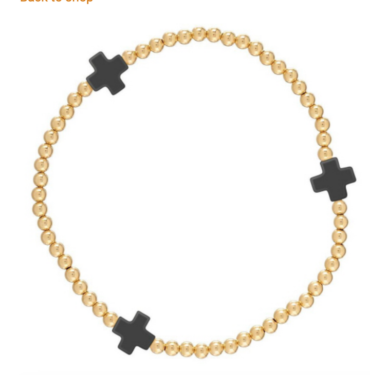 Enewton Signature Cross 3mm bracelet featuring a sleek metal cross charm on a minimalist accessory design.