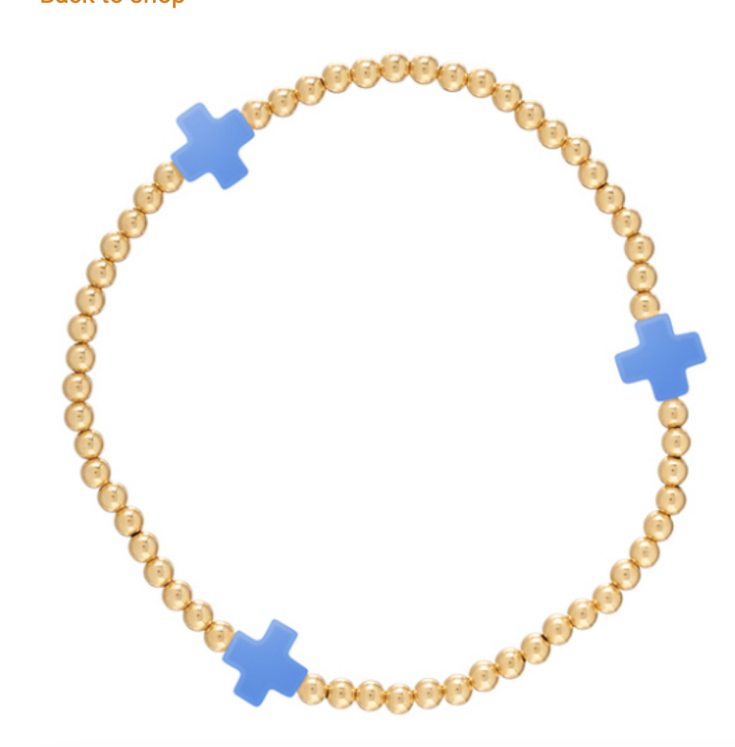 Enewton Signature Cross 3mm bracelet featuring a sleek metal cross charm on a black leather strap.