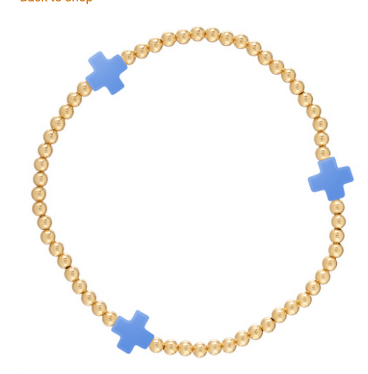 Enewton Signature Cross 3mm bracelet featuring a sleek metal cross charm on a black leather strap.