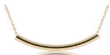 Gold necklace with a curved pendant on a white background