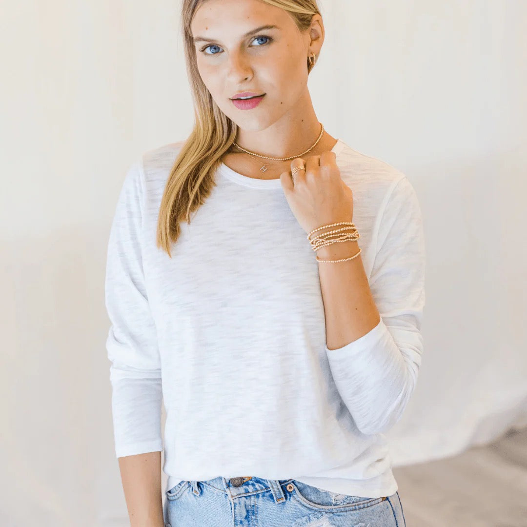 Erin Gray classic long sleeve tee in neutral color, showing a relaxed fit and soft fabric, casual tops for everyday wear.