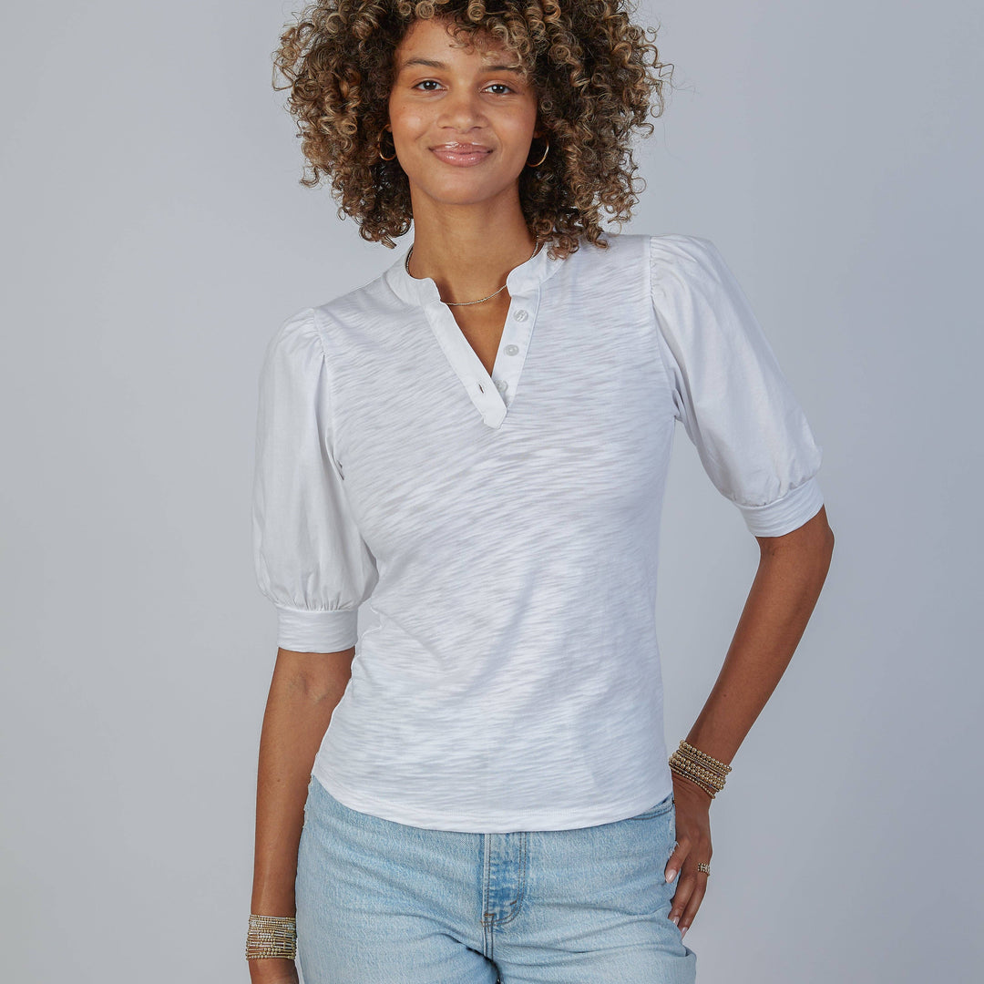 White Kate puff sleeve tee by Erin Gray featuring a V-neck design, styled as a casual women's top.