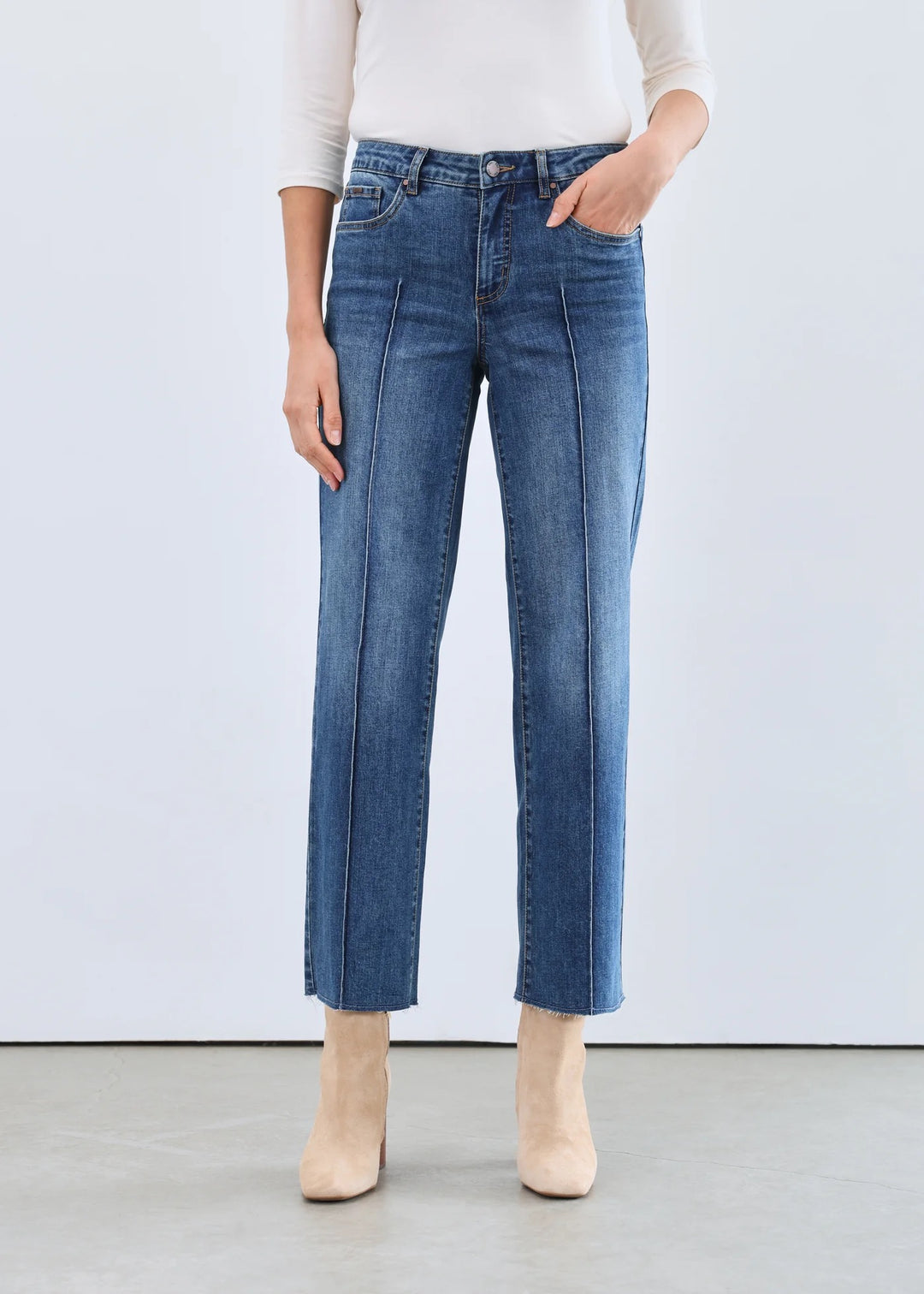 FDJ Olivia Wide Ankle Jean bottoms featuring classic denim fabric and a relaxed fit, shown on a model with rolled cuffs.