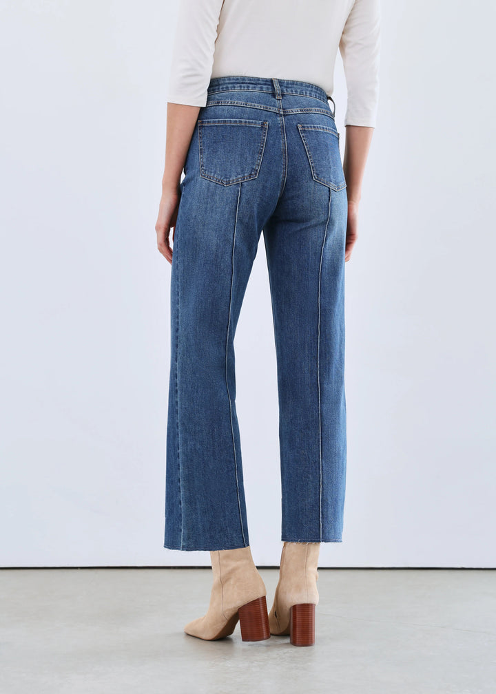 FDJ Olivia Wide Ankle Jean showcasing a high-waisted, light-wash denim bottoms with a relaxed fit and wide ankle cuffs.