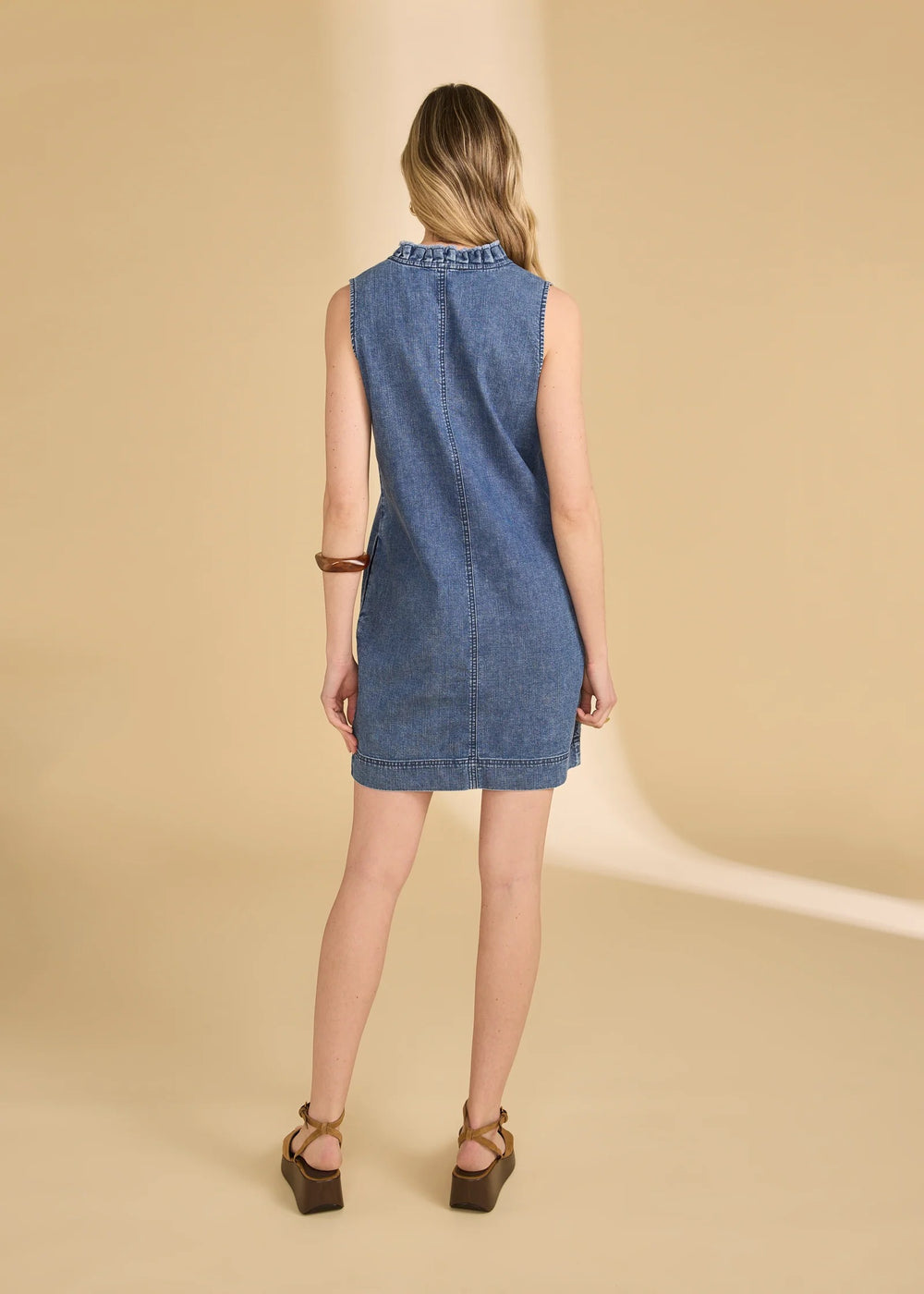 FDJ denim shift dress, sleeveless casual dress featuring classic blue denim fabric and a simple, stylish silhouette.
