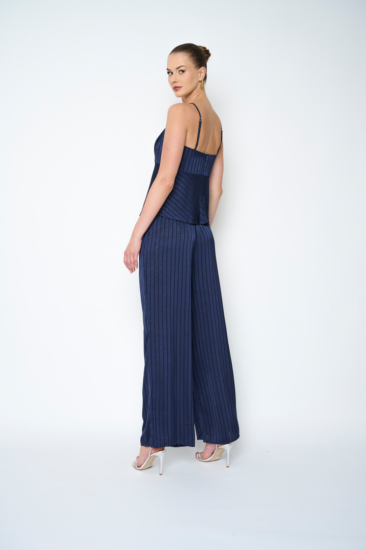 Navy Flora Bea Stephani Pants, stylish bottoms with a tailored fit, shown on a model against a neutral background.