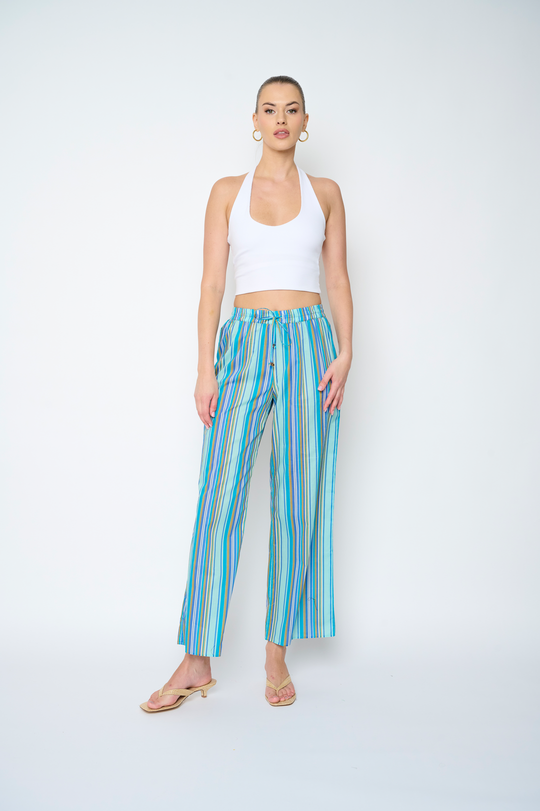 Flora Bea Rolla Super Stripe Pant, stylish striped bottoms with a relaxed fit and modern design, shown on a model.
