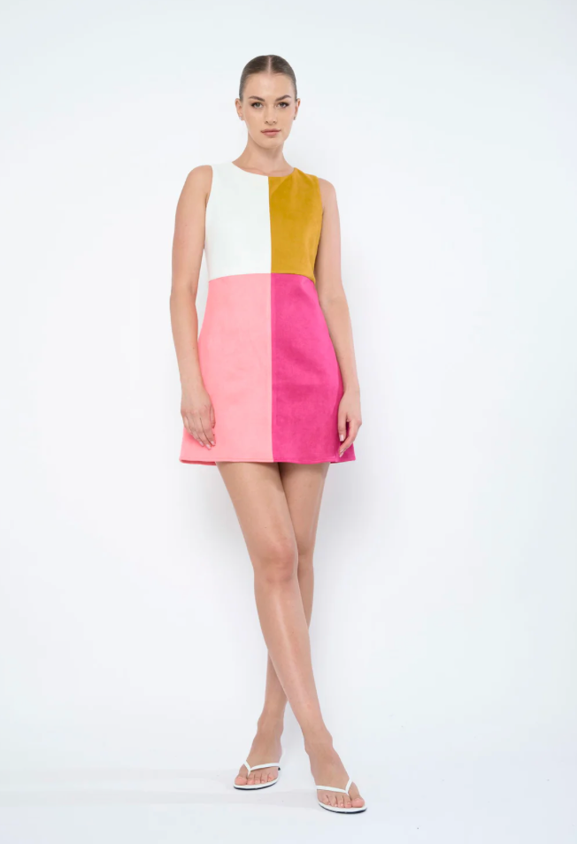 Flora Bea Ellis colorblock dress with contrasting panels in blue, white, and black, displayed on a mannequin.